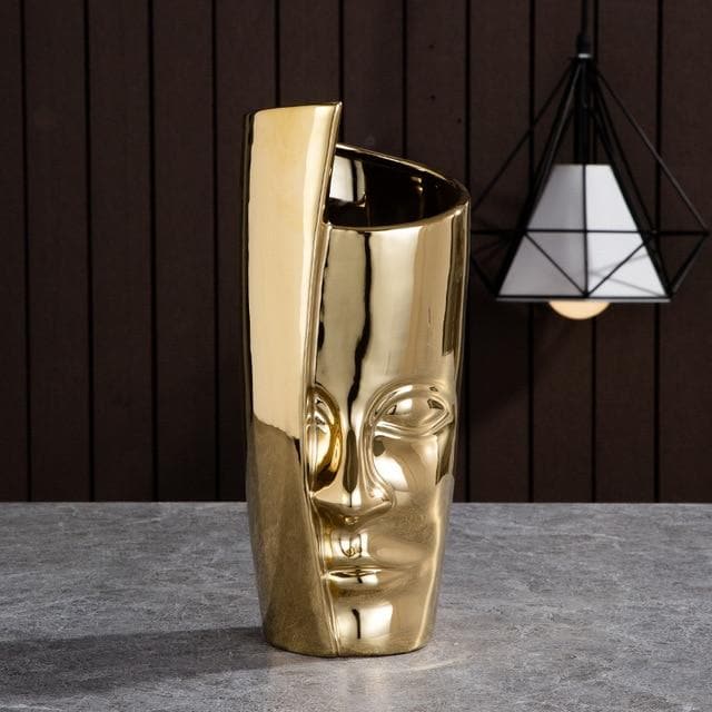 Skulpturelle keramikvaser og plantekrukker med kunstneriske ansigtsinspirerede designs