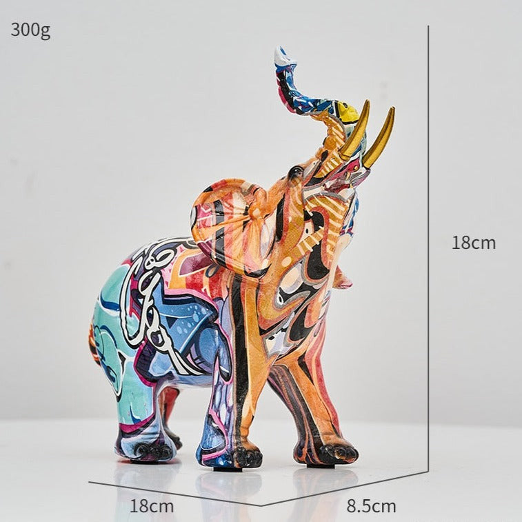Farbenfrohe Elefantenfigur aus Kunstharz mit nordisch und graffitiinspirierten Designs