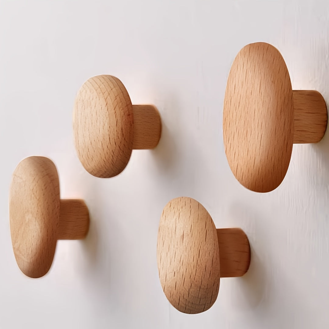 Set van 4 organische houten wandhaken met gladde, matte afwerking