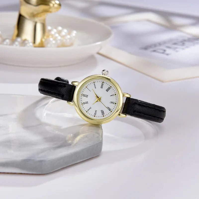 Billie Elegante goldene Damenuhr mit römischem Zifferblatt