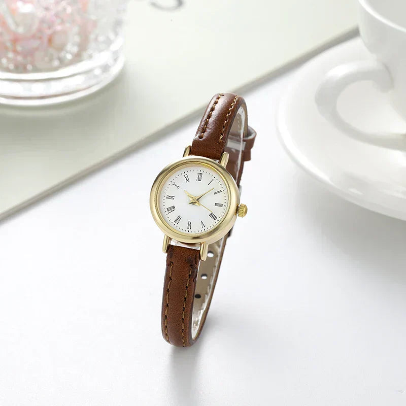 Billie Elegante goldene Damenuhr mit römischem Zifferblatt