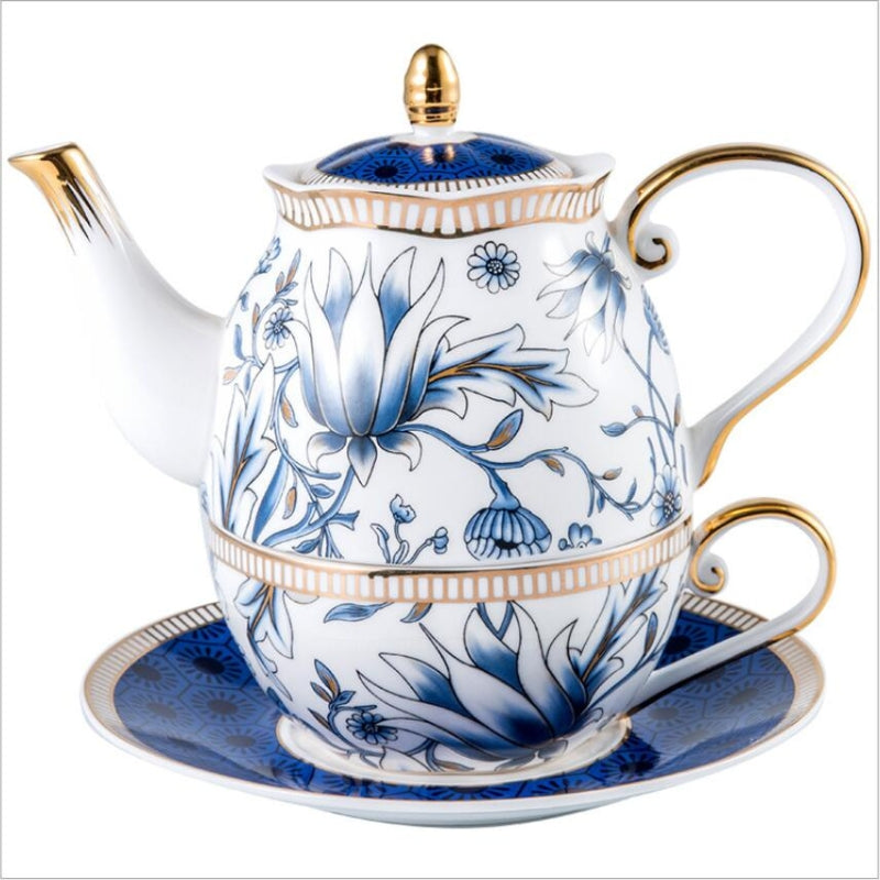 Blå Blomstret Te til En Porcelæn Tekande Kop Sæt