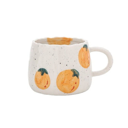 Keramische koffiemok met speels fruitdesign