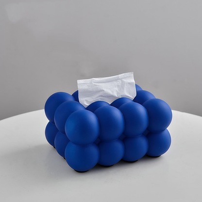 Servietboks i keramik med legende kugleformet design