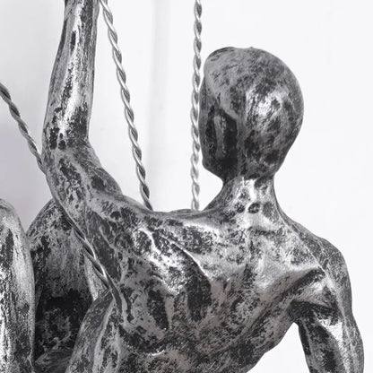 Sæt med vægskulpturer af klatrende mænd i industrielt design af kunstharpiks