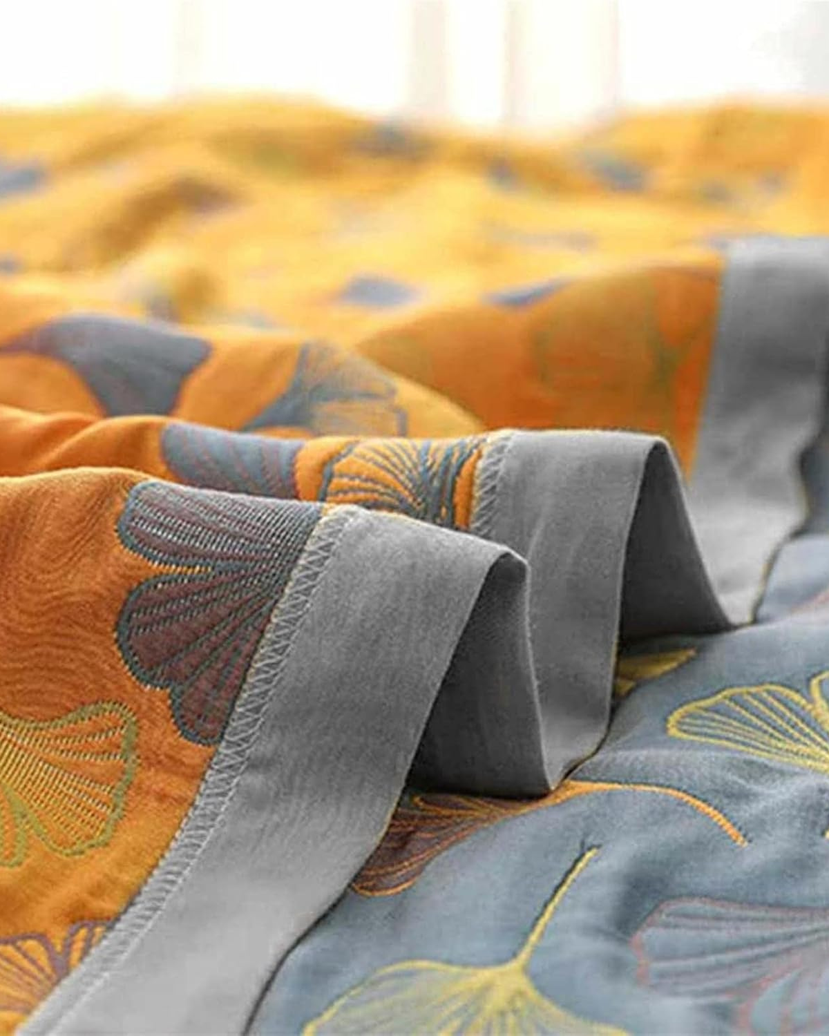 Katoenen plaid met reliëfbladpatroon en omkeerbaar ontwerp