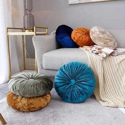 Rund pude i knust velour med blødt fiberfyld