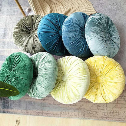 Rund pude i knust velour med blødt fiberfyld