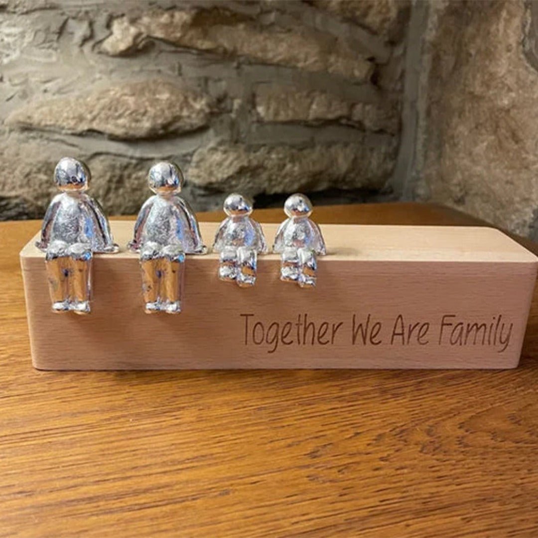 Familieskulptur – håndlavet dekorationsfigur, der symboliserer familiens sammenhold