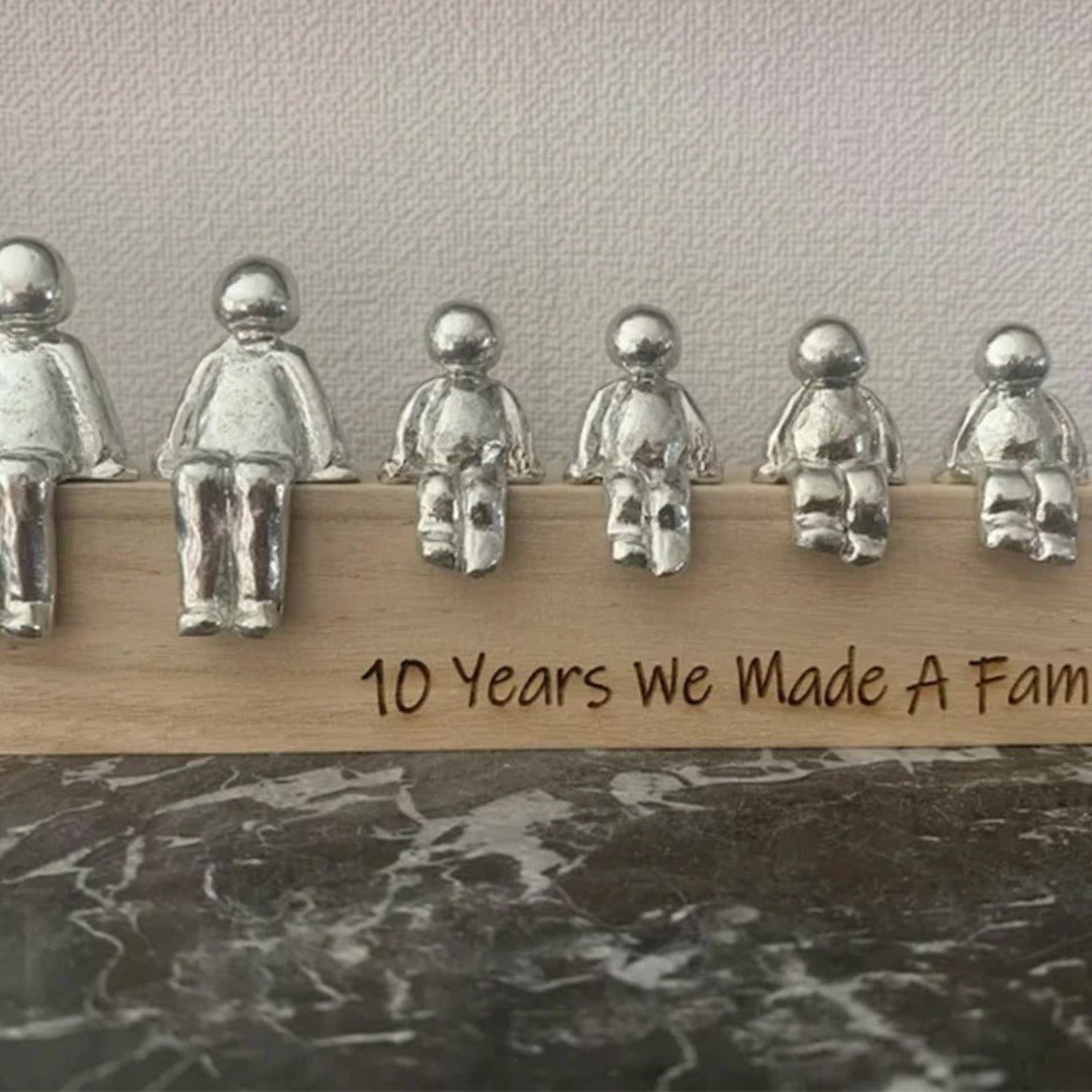 Familieskulptur – håndlavet dekorationsfigur, der symboliserer familiens sammenhold