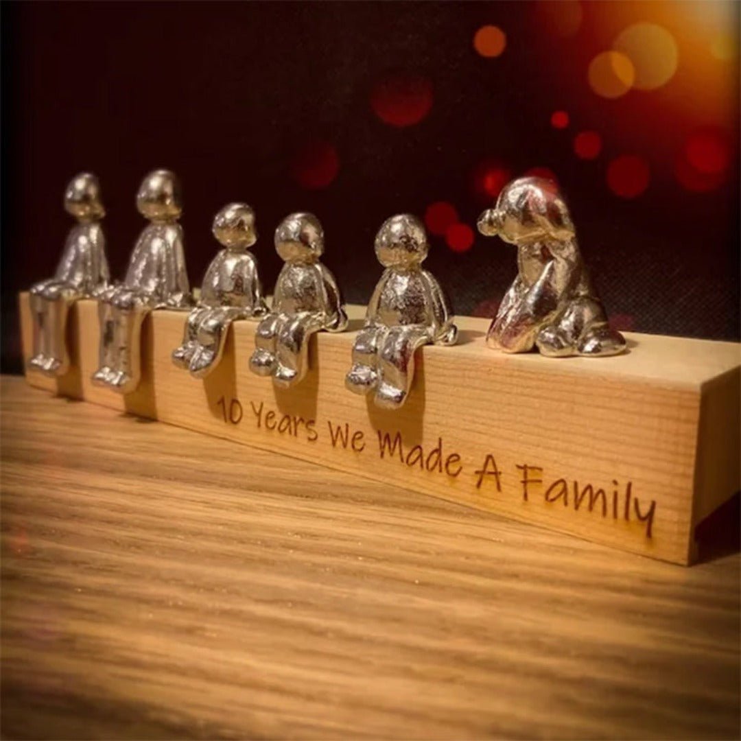 Familieskulptur – håndlavet dekorationsfigur, der symboliserer familiens sammenhold