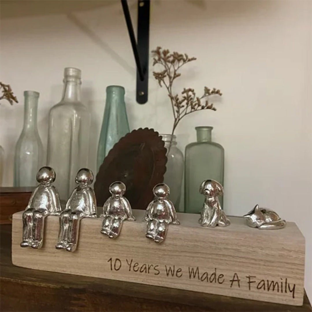 Familieskulptur – håndlavet dekorationsfigur, der symboliserer familiens sammenhold