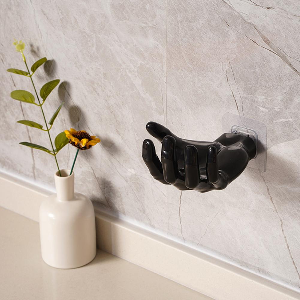 Glanzende wandhaak van polyresine met effen patroon