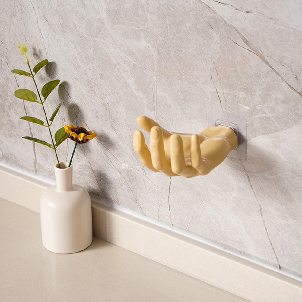 Glanzende wandhaak van polyresine met effen patroon