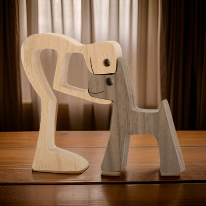 Handgefertigte Skulptur aus Massivholz mit Mensch und Hund in emotionalem Design