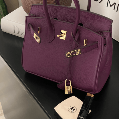 Lederhandtasche für Damen mit verstellbarem Riemen und geräumigem Design  