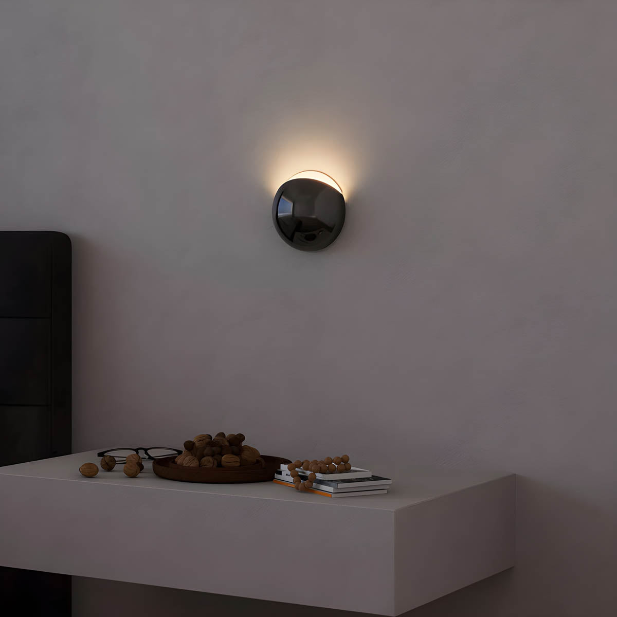 Minimalistische, von Kieselsteinen inspirierte LED-Wandleuchte mit warmweißem Licht