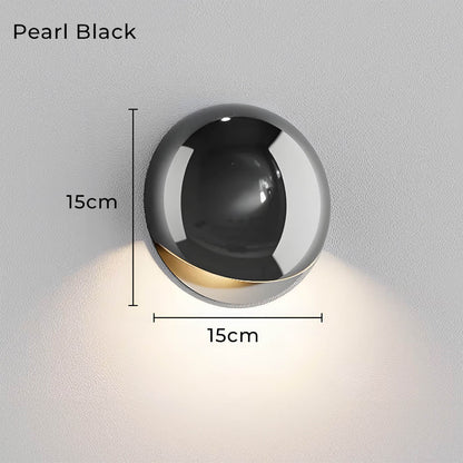 Minimalistische, von Kieselsteinen inspirierte LED-Wandleuchte mit warmweißem Licht