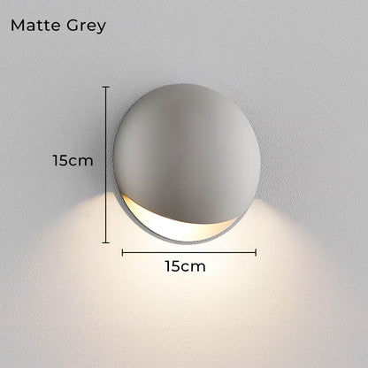 Minimalistische, von Kieselsteinen inspirierte LED-Wandleuchte mit warmweißem Licht