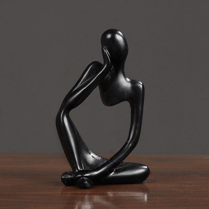 Minimalistisk tænker-skulptur med moderne design