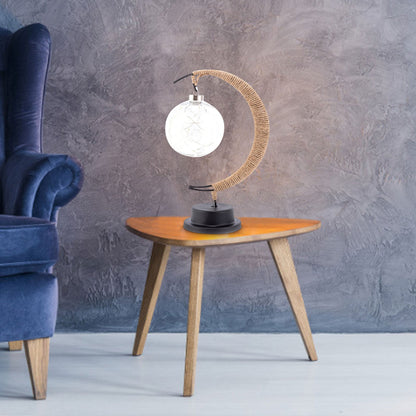 Maan-geïnspireerde tafellamp met warm licht en draadloos ontwerp op batterijen