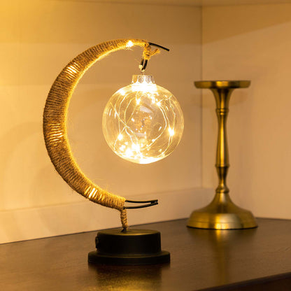 Maan-geïnspireerde tafellamp met warm licht en draadloos ontwerp op batterijen