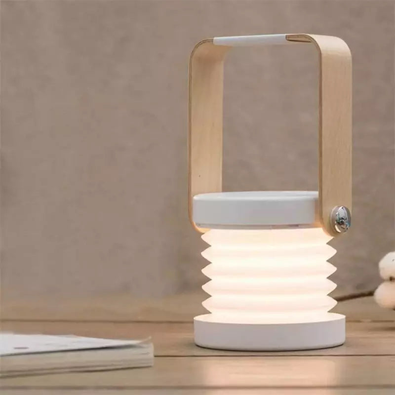 Tragbare dimmbare LED-Tischlampe mit klappbarem Design