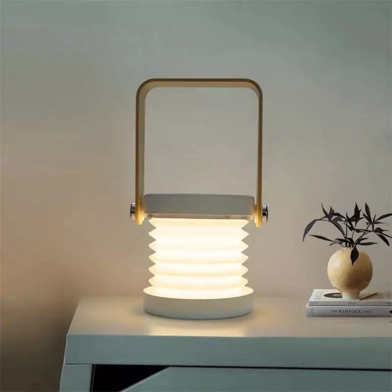 Tragbare dimmbare LED-Tischlampe mit klappbarem Design