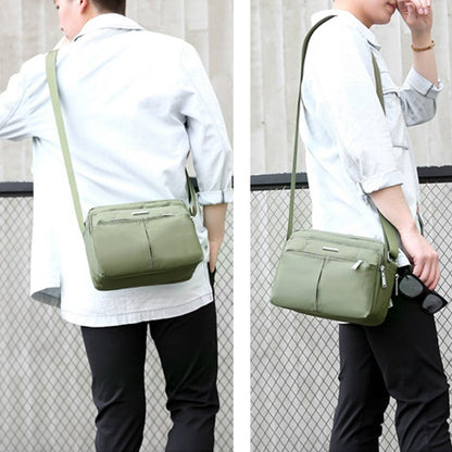 Waterdichte multi-pocket messenger tas met verstelbare schouderband