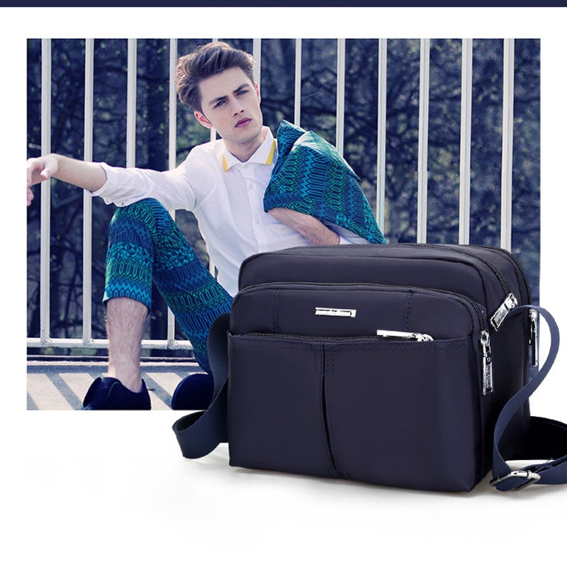 Waterdichte multi-pocket messenger tas met verstelbare schouderband