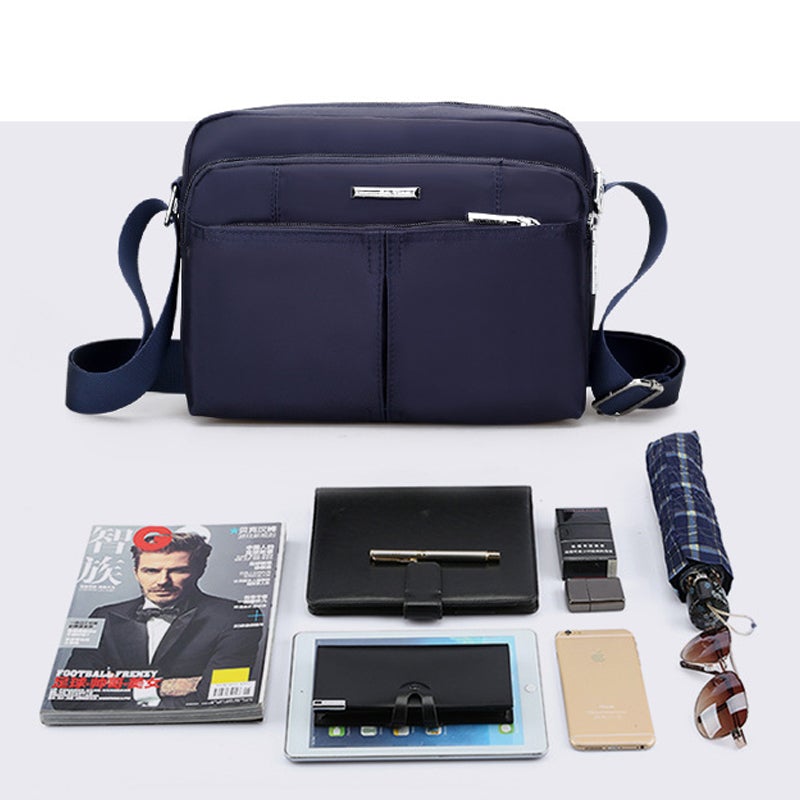 Waterdichte multi-pocket messenger tas met verstelbare schouderband