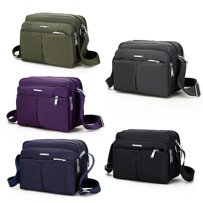 Waterdichte multi-pocket messenger tas met verstelbare schouderband