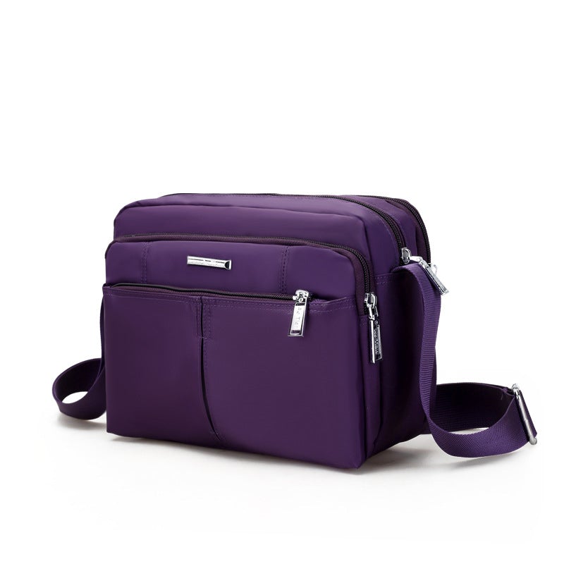 Waterdichte multi-pocket messenger tas met verstelbare schouderband
