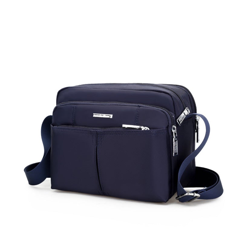 Waterdichte multi-pocket messenger tas met verstelbare schouderband