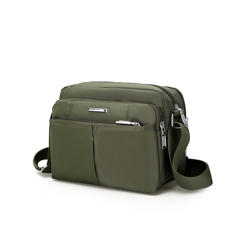 Waterdichte multi-pocket messenger tas met verstelbare schouderband
