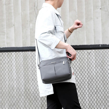 Waterdichte multi-pocket messenger tas met verstelbare schouderband